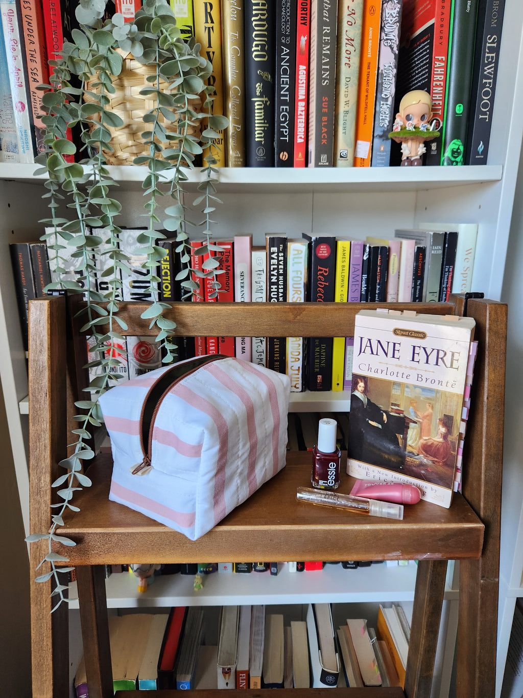 pink and white stripey makeup bag (brown zipper)