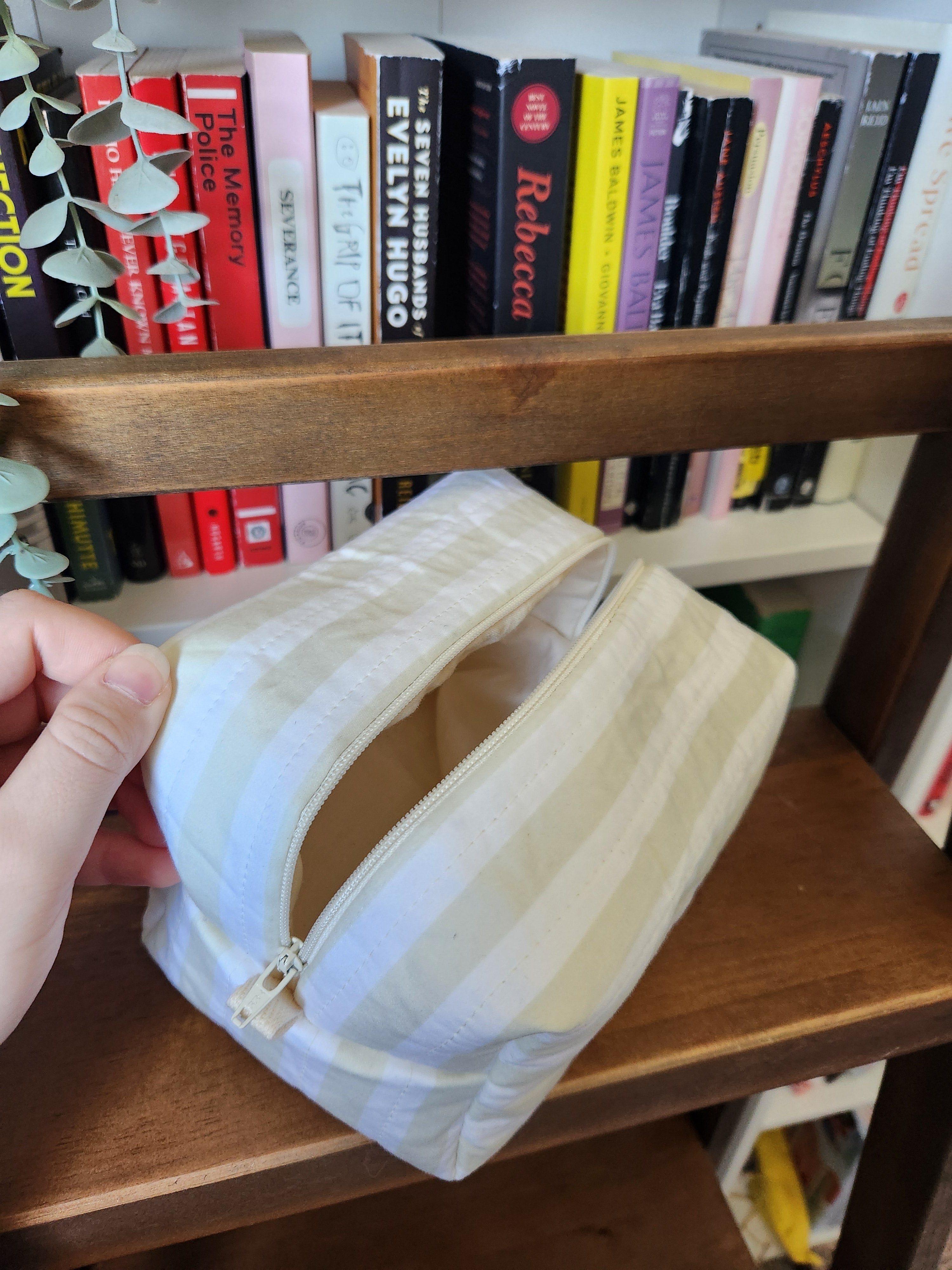 green and white stripey makeup bag