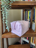 pink towel makeup bag